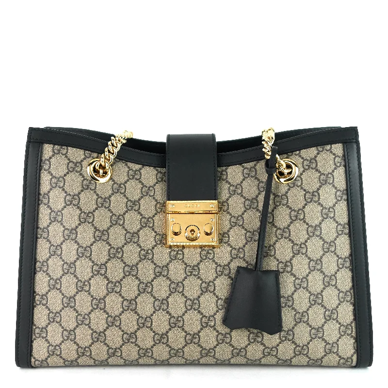 Women Gucci bags with interlocking G hardware for a classic lookMedium Supreme GG Canvas Padlock Shoulder Bag