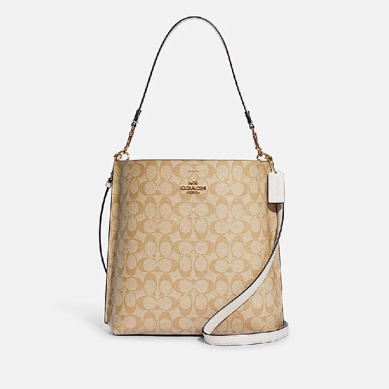 Coach crossbody bags with a woven leather strap for a unique textureCoach Mollie Bucket Bag In Signature Canvas in Khaki/Chalk (CA561)