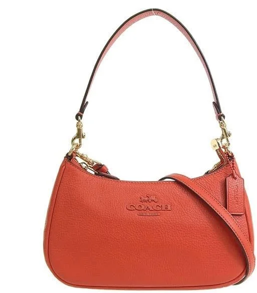 Coach Borough bags with a structured silhouette and a magnetic - snap closureCoach Teri Leather Shoulder Bag