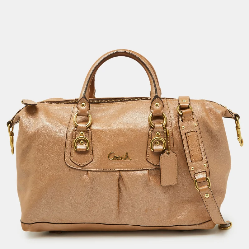 Coach tote bags with a snap - button closure and a decorative charm for styleBeige Leather Ashley Satchel