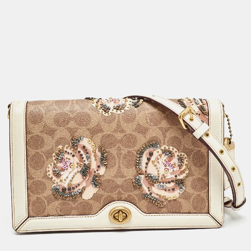 Coach Rogue bags featuring the signature C - hardware for a branded lookBeoge/Old Rose Signature Coated Canvas and Leather Rose Embellished Riley Crossbody Bag