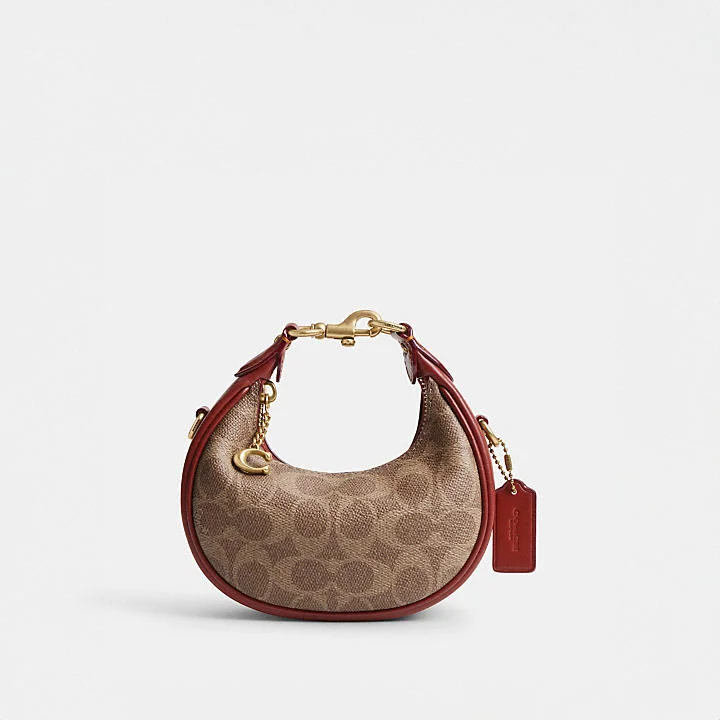 Coach bags with a back - zip pocket for storing valuables securelyCoach Jonnie Bag in Signature Canvas