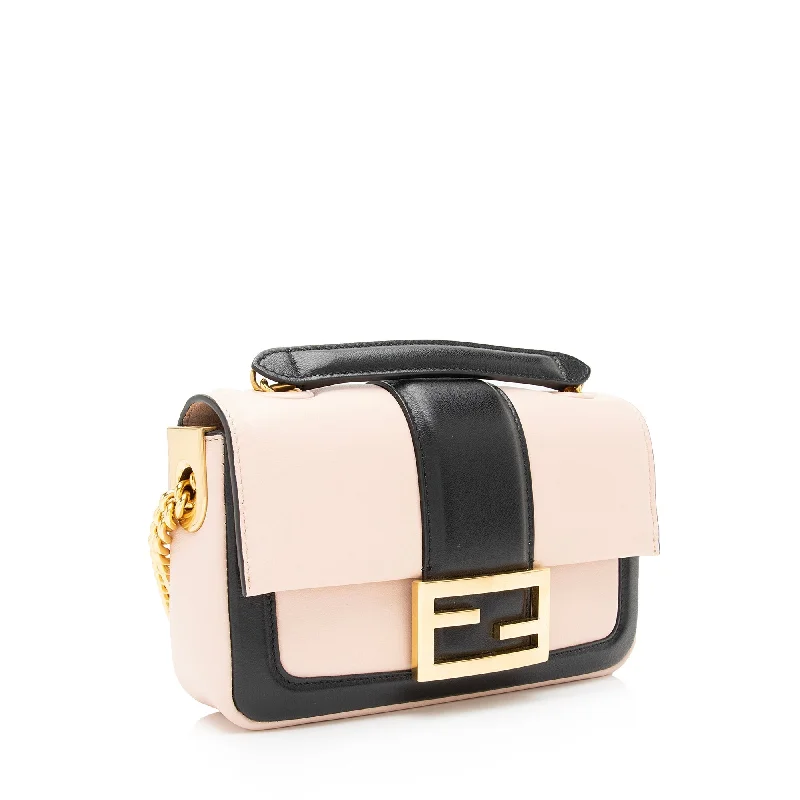 Fendi Baguette bags with a detachable charm featuring the brand's mascotFendi Lambskin Bi Color Baguette Mini Chain Bag (SHF-23605)