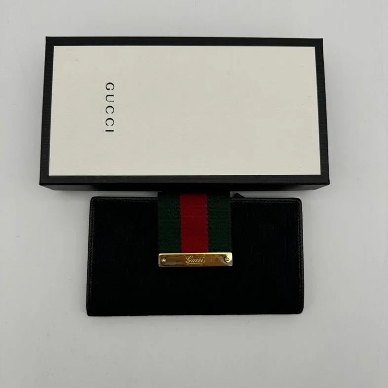 Ladies Gucci shoulder bags with a magnetic - closure flapGucci Black Canvas Leather Wallet with Red Green Stripe Closure Standard Size