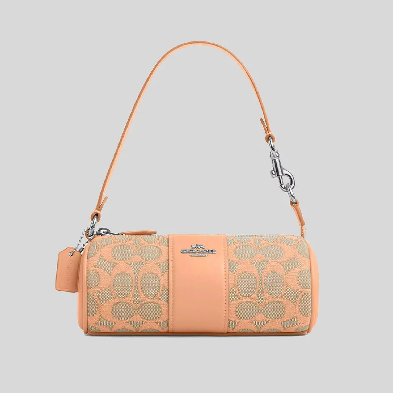 Coach bags with a detachable mobile phone holder for on - the - go useCOACH Nolita Barrel Bag In Signature Jacquard Faded Blush CU003