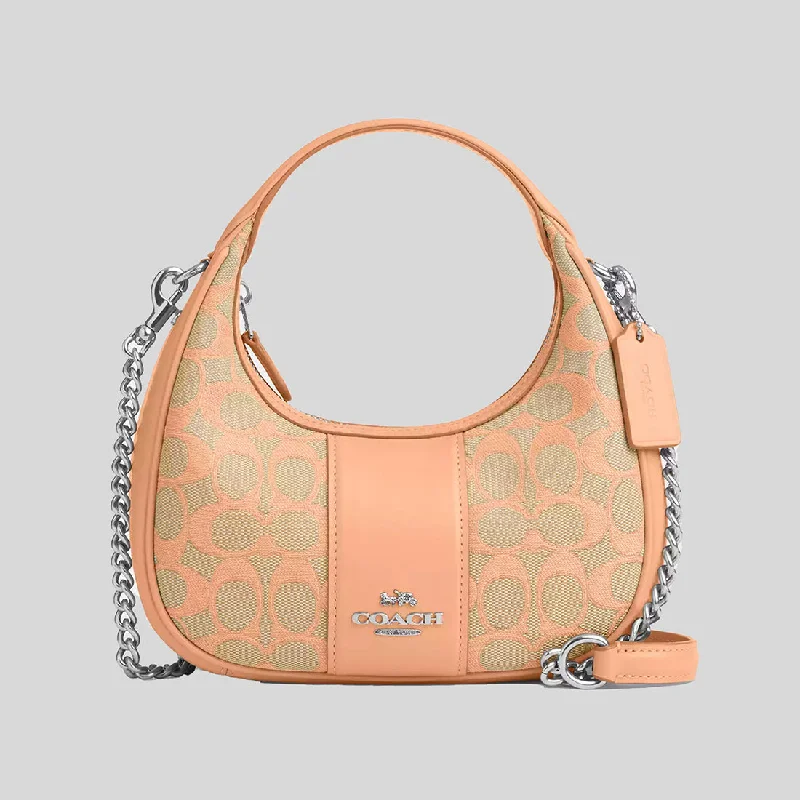 Ladies Coach Tabby bags with gold - toned hardware for a touch of luxuryCOACH Carmen Mini Crossbody In Signature Jacquard Faded Blush CT773