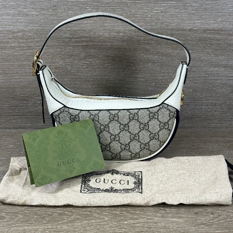 Women Gucci bags with a chain - link trim and a leather bodyGucci GG Ophidia Mini Bag