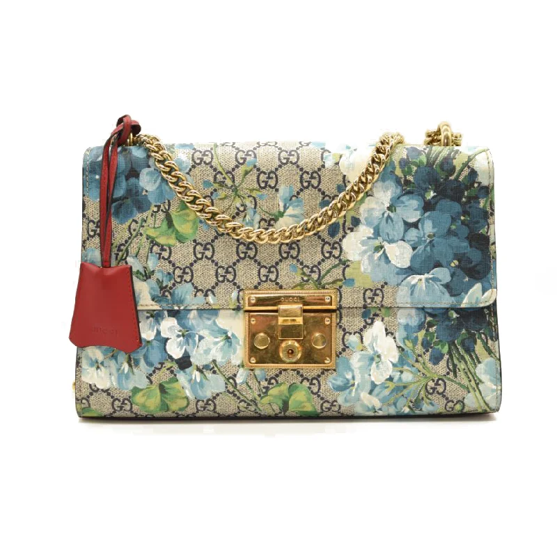 Women Gucci crossbody bags with a woven leather strapGUCCI GG Supreme Blooms Medium Padlock Shoulder Bag