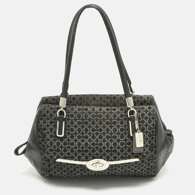 Coach Dempsey bags with a crystal - embellished C - logo for added luxuryBlack Op Art Fabric and Leather Madison Madeline Satchel