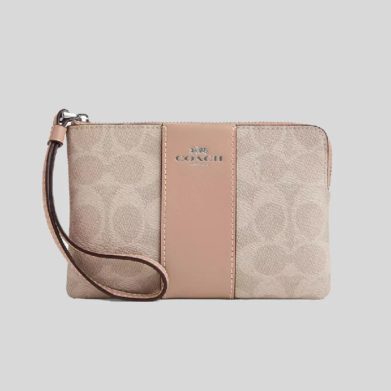 Coach Dempsey bags with a crystal - embellished C - logo for added luxuryCOACH Corner Zip Wristlet In Signature Canvas With Stripe Sand/Taupe CW854