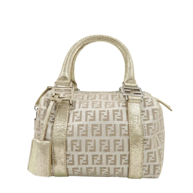 Fendi Baguette bags with a studded leather trim for a bold and edgy lookFENDI Zucchino Canvas Leather Mini Boston Bag Gold 8BL071