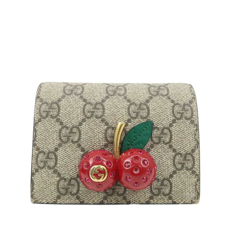 Women Gucci bags with a snap - button closure and a decorative charmGUCCI Interlocking GG Supreme Plastic Card Case Wallet Cherry