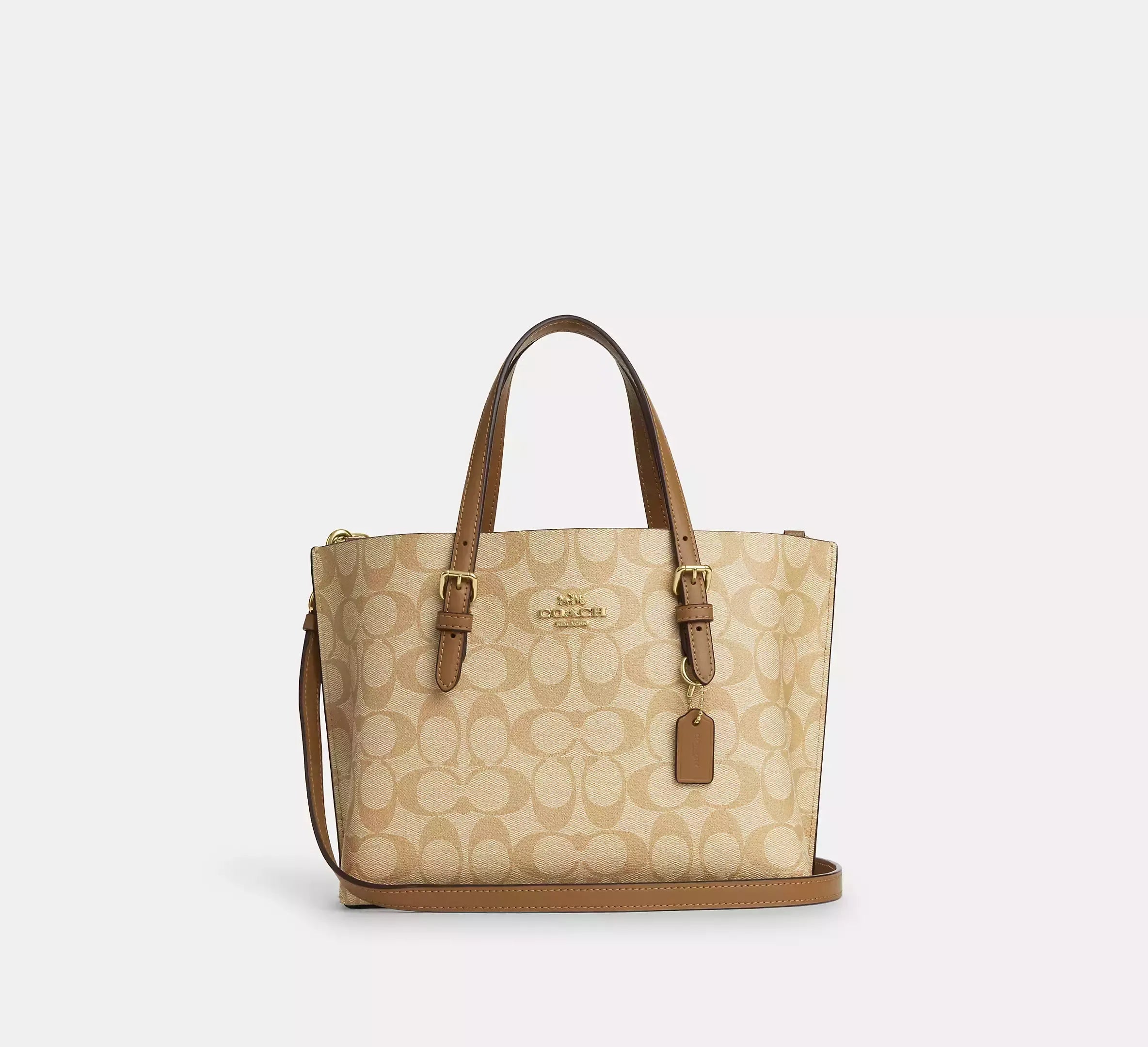 Coach Rogue bags featuring the signature C - hardware for a branded lookCoach Mollie Tote 25 in Signature Canvas Khaki Saddle