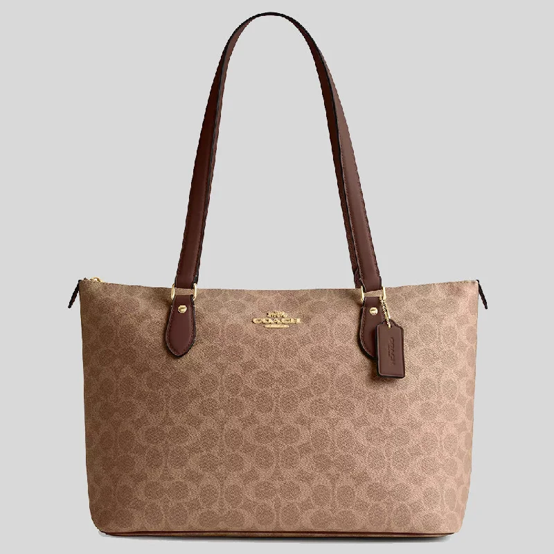 Coach handbags with a beaded trim for a glamorous and elegant lookCOACH Gallery Tote Bag In Signature Canvas Tan/Brown CW381