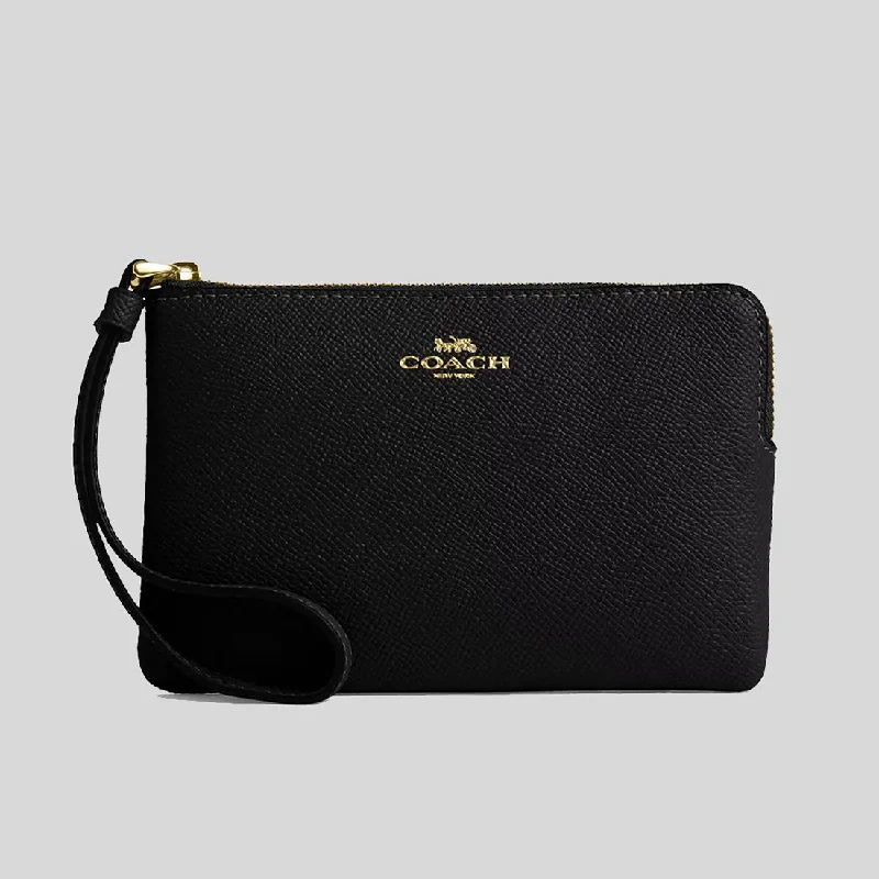 Coach Tabby bags with a classic turnlock closure for a timeless styleCOACH Corner Zip Wristlet Black CV396