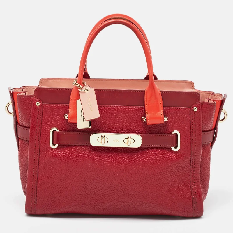 Coach crossbody bags in a vibrant, eye - catching color for a bold statementTwo Tone Red Leather Swagger 27 Carryall Tote