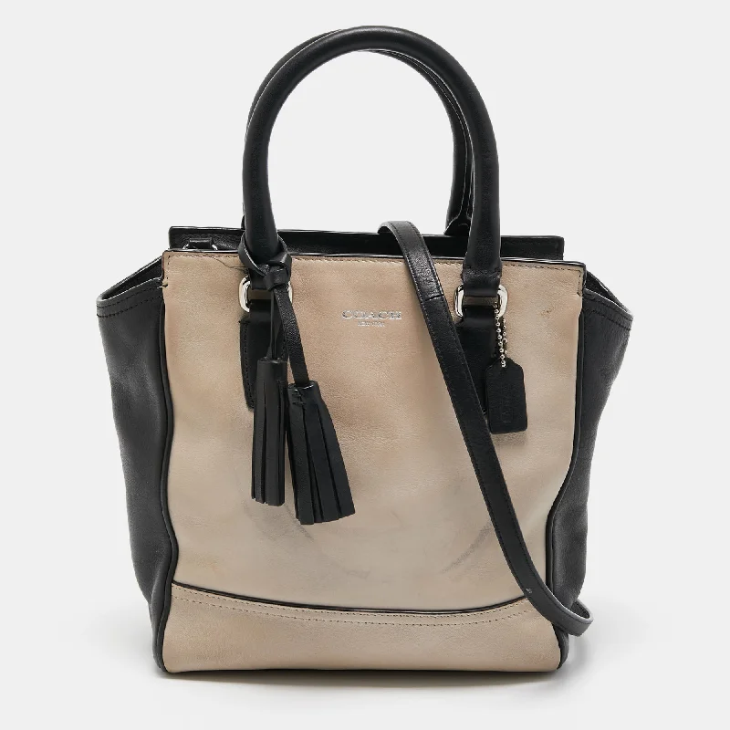 Coach handbags with a metal - framed clasp for durability and styleBlack/Beige Leather Tassel Tote