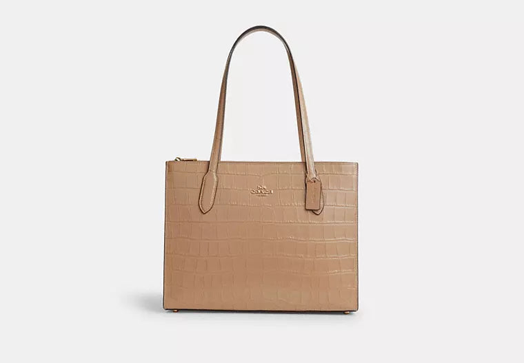 Coach Rogue bags with a monogram - embossed leather surfaceCoach Nina Tote