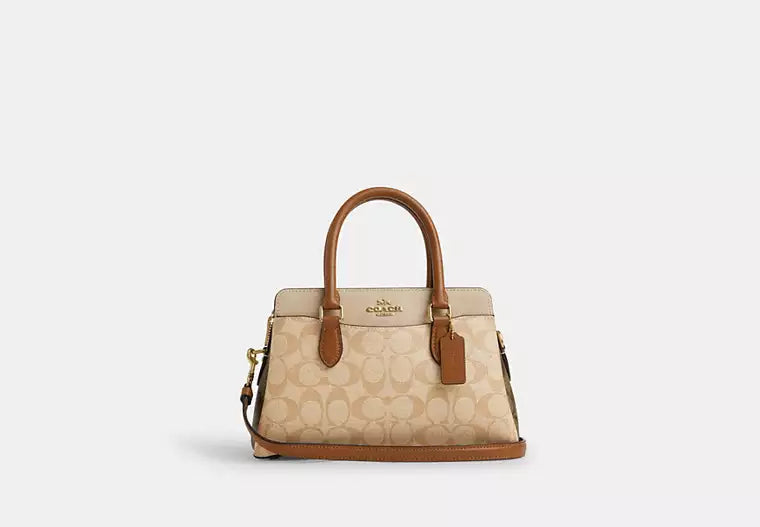 Coach tote bags with a printed Coach logo for brand visibilityCoach Mini Darcie Carryall Bag In Blocked Signature Canvas