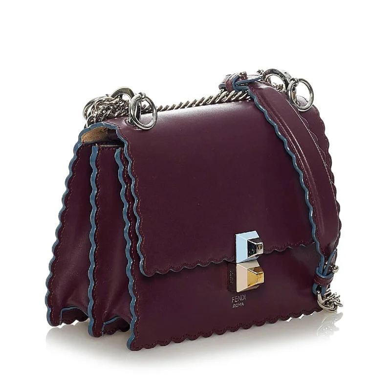 Fendi Baguette bags in a limited - edition colorway for a rare and exclusive lookFendi Kan I Leather Crossbody Bag (SHG-28883)