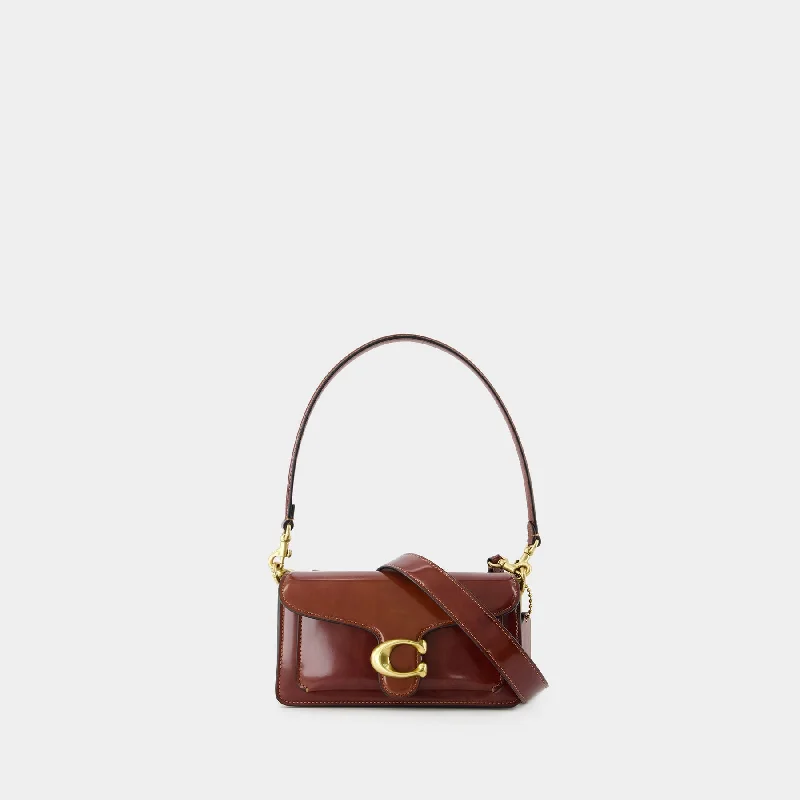 Coach tote bags with a snap - button closure and a decorative charm for styleTabby 20 Shoulder Bag - Coach - Leather - Brown