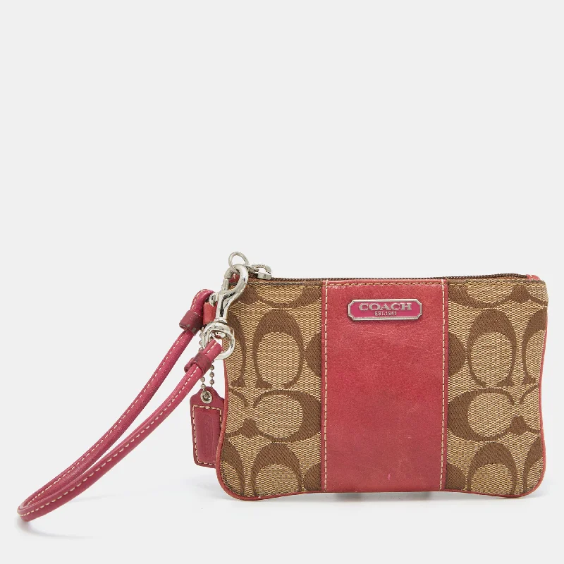 Coach Dempsey bags with a leather - wrapped drawstring for a luxurious feelBeige/Pink Signature Canvas and Leather Wristlet Pouch