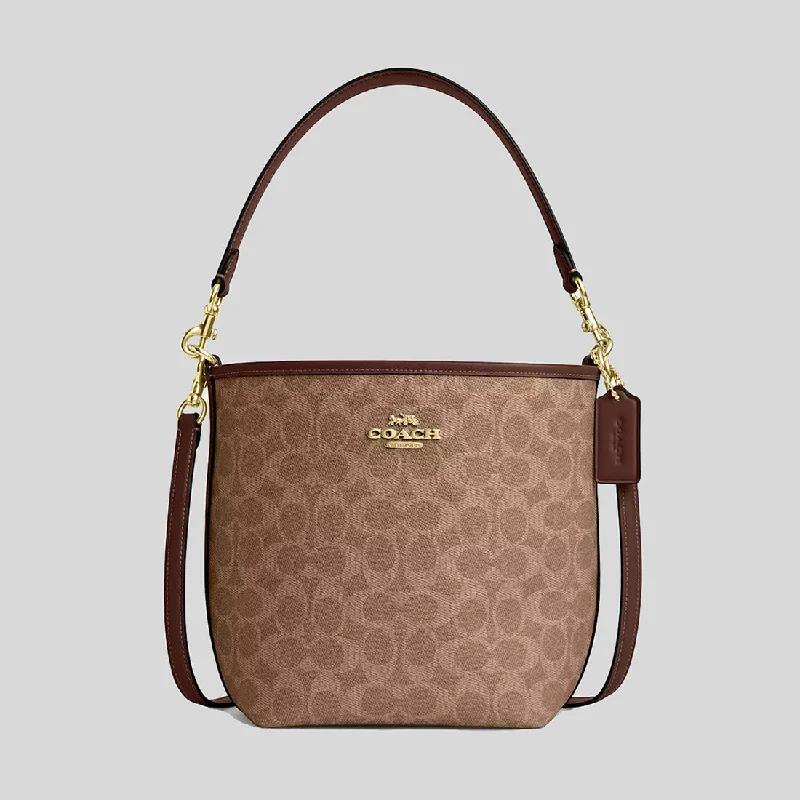 Coach Borough bags with a contrast - stitched handle for a unique lookCOACH City Bucket Bag In Signature Canvas Tan/Brown CT800