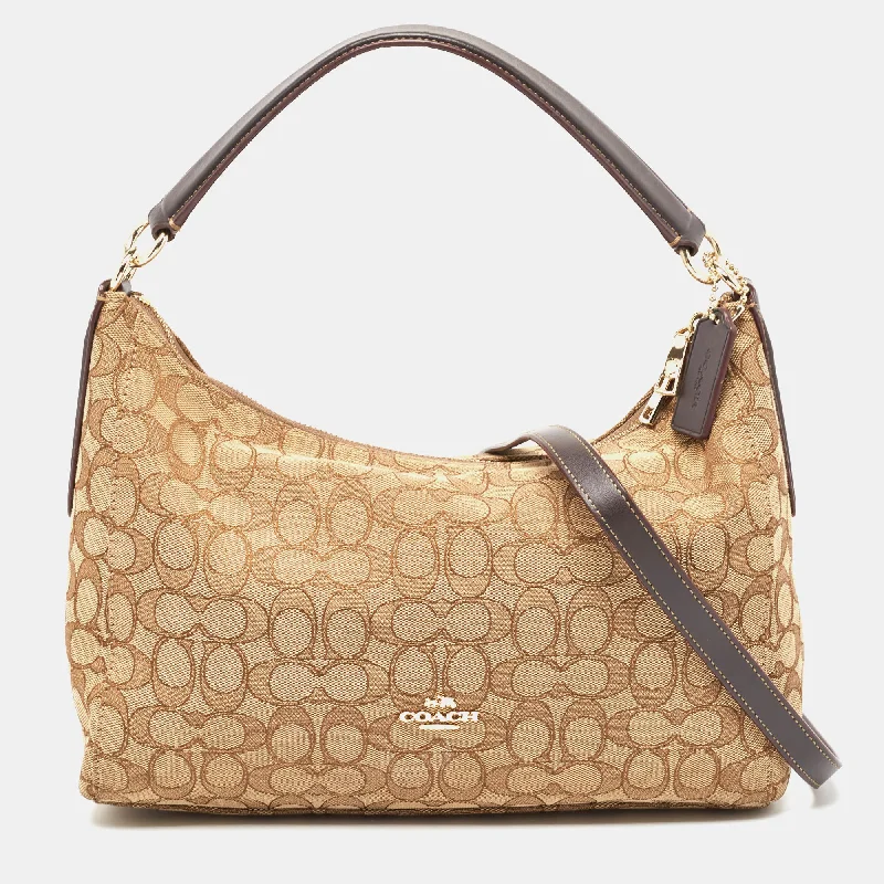 Coach Borough bags with a structured silhouette and a magnetic - snap closureBeige Signature Canvas East West Celeste Hobo