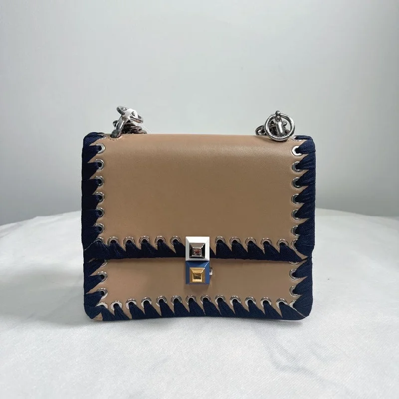 Fendi bags with a chain - link trim and a leather body for a modern and edgy lookFendi Dotcom Beige Navy Leather Handbag Medium