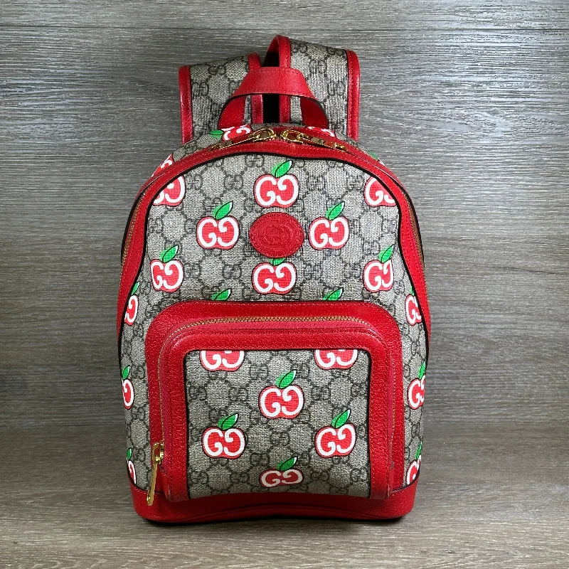 Ladies Gucci handbags with a detachable coin purse insideGucci GG Supreme Canvas Interlocking Apple Backpack