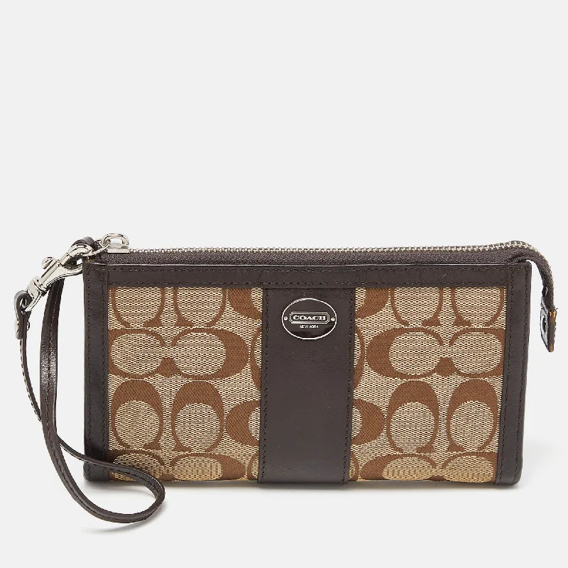 Coach bags with a front - flap pocket and a turnlock for a classic aestheticBrown/Beige Signature Canvas and Leather Zip Wristlet Pouch