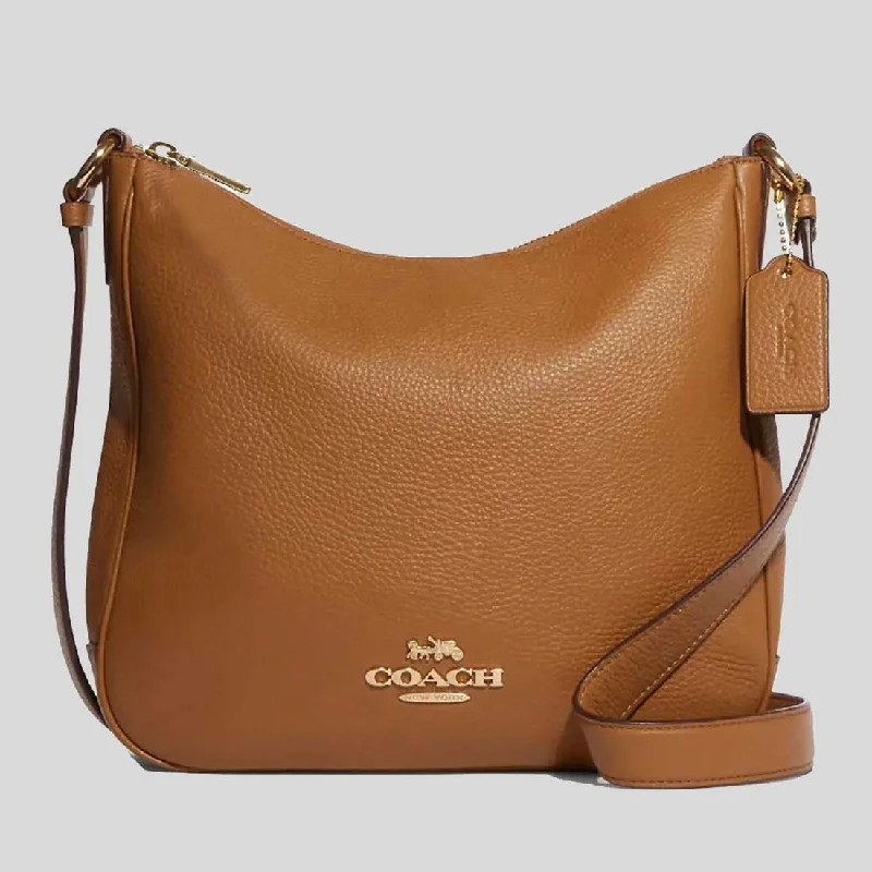 Coach tote bags with a snap - button closure and a decorative charm for styleCOACH Ellie File Bag Light Saddle CU960