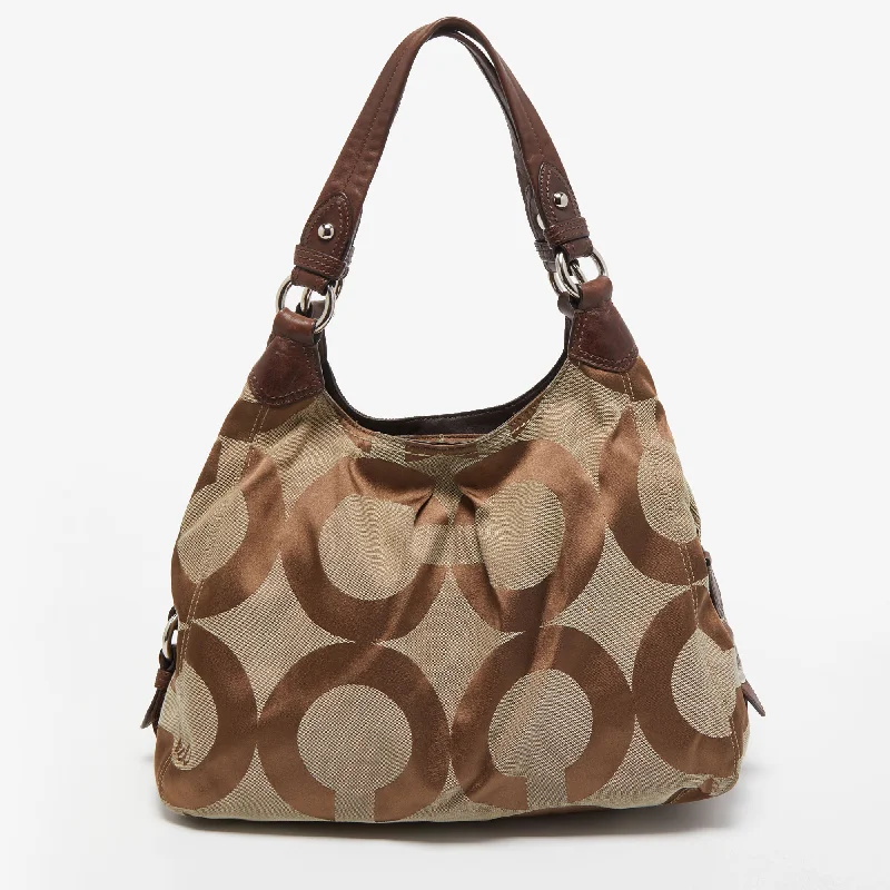 Coach crossbody bags with a printed floral pattern for a feminine touchBrown/Beige Signature Canvas and Leather Shoulder Bag