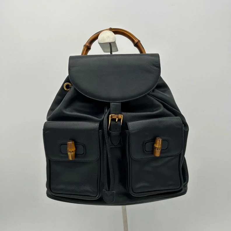 Women Gucci backpacks with a luxurious leather finishGucci Black Leather Bamboo Handle Backpack Medium Size