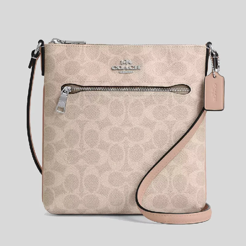 Coach Borough bags with a removable interior organizerCOACH Mini Rowan File Bag In Signature Canvas Sand/Taupe CW325