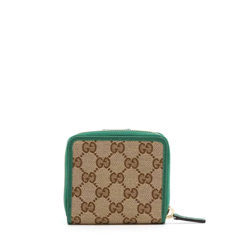 Women Gucci bags with a snap - button closure and a decorative charmGucci Wallets