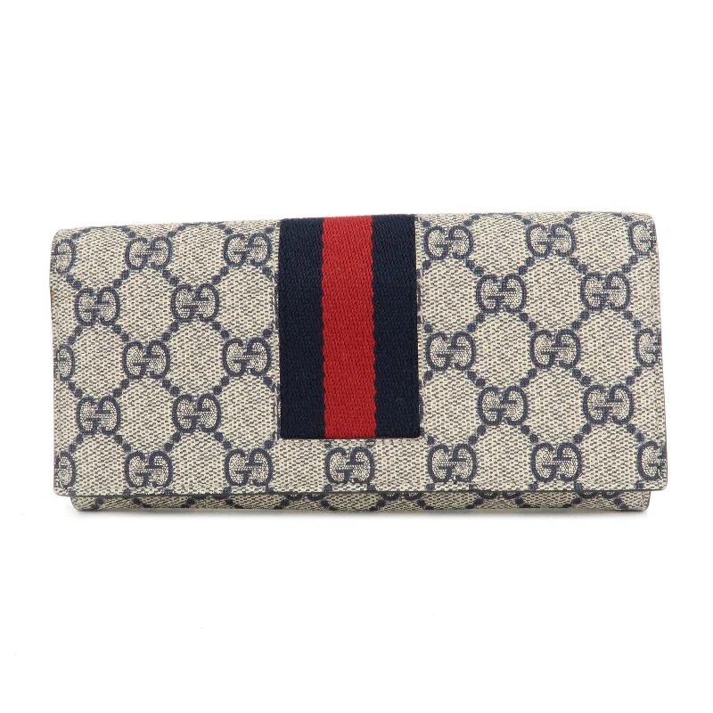 Women Gucci tote bags in GG Supreme canvas for a branded feelGUCCI Sherry GG Supreme Leather Bifold Long Wallet 408830 Navy