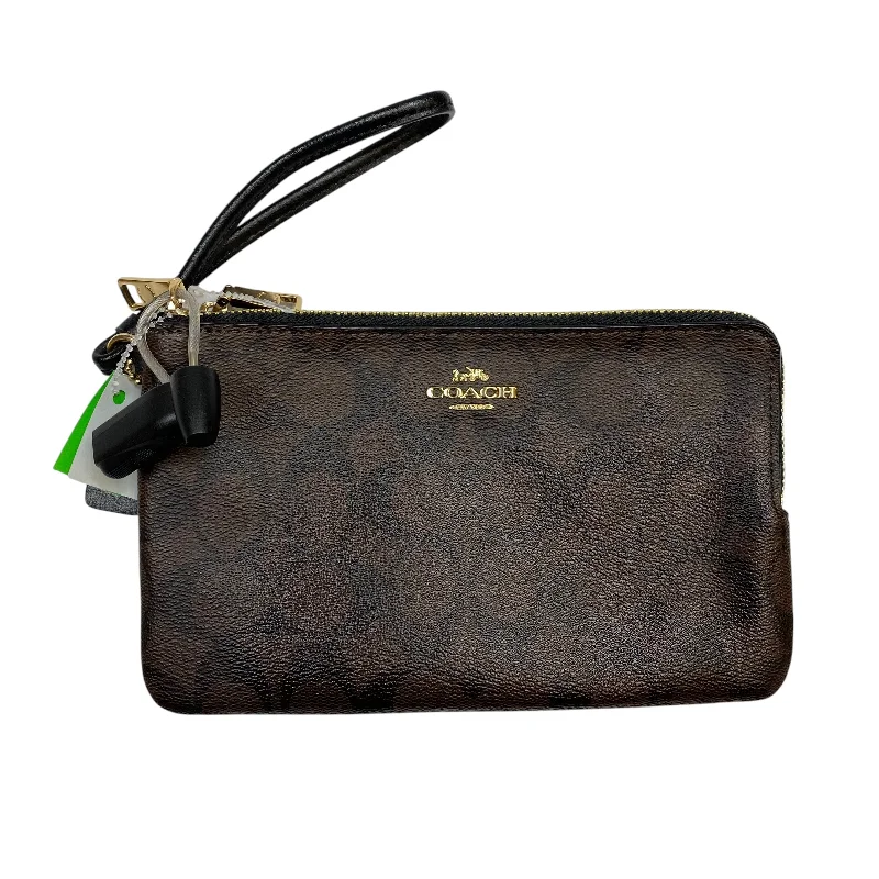 Coach Dempsey bags with a crystal - embellished C - logo for added luxuryWristlet Designer By Coach, Size: Large