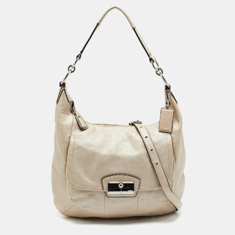 Coach backpacks with a hidden back pocket for securityIvory Leather Kristin Hobo