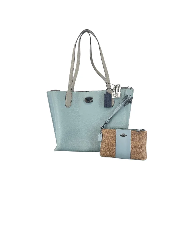 Coach Dempsey bags with a contrast - colored interior for visual interestHandbag Designer By Coach, Size: Medium