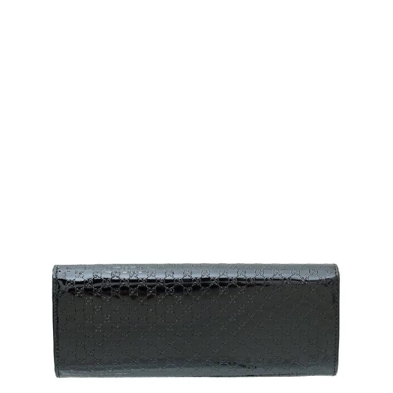 Women Gucci bags with a front - flap pocket for quick - access itemsGucci Black GG MicroGuccissima Broadway Clutch