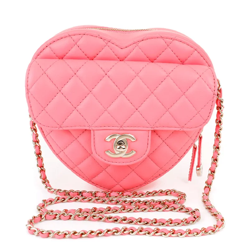 Chanel bags with classic and elegant designsChanel 2022 Pink Lambskin Heart Bag w/ Gold Hardware