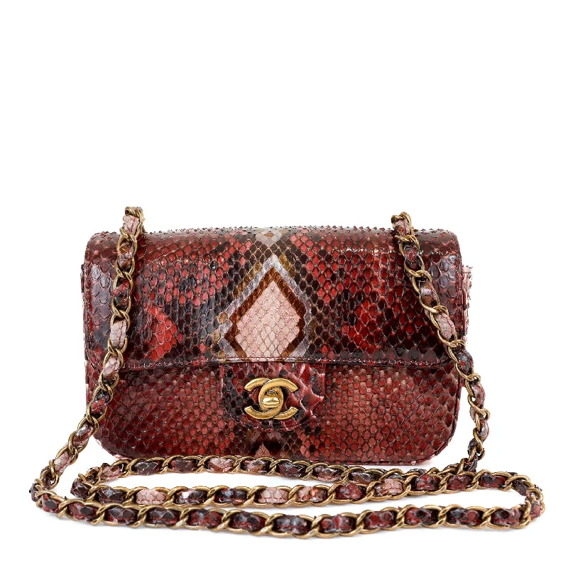 Chanel bags available at online luxury retaileChanel Burgundy Python Small Classic Flap