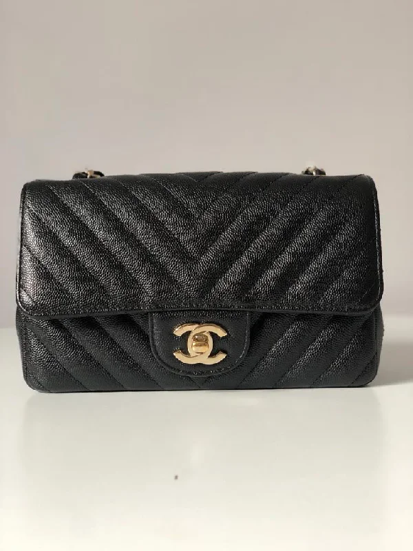 Chanel bags available at online luxury retaileCHANEL Caviar Black Chevron Classic Flap Mini GHW