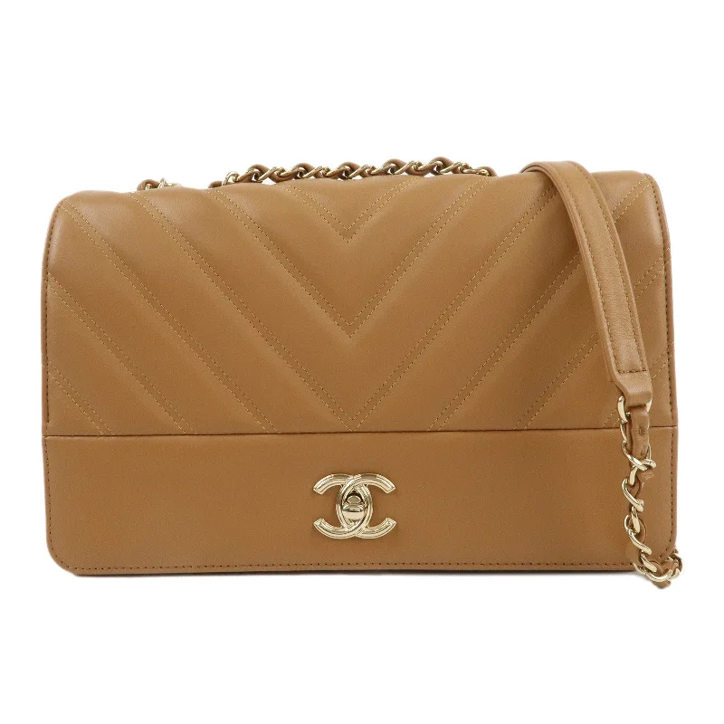 Chanel bags available at online luxury retaileCHANEL Chevron Lamb Skin COCO Mark Chain Shoulder Bag Beige