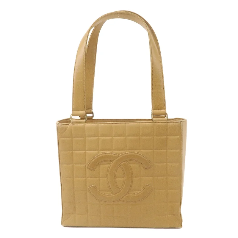 Chanel bags with the perfect balance of luxury and functionalityCHANEL Chocolate Bar Coco Mark Lamb Skin Tote Bag Beige 7287336