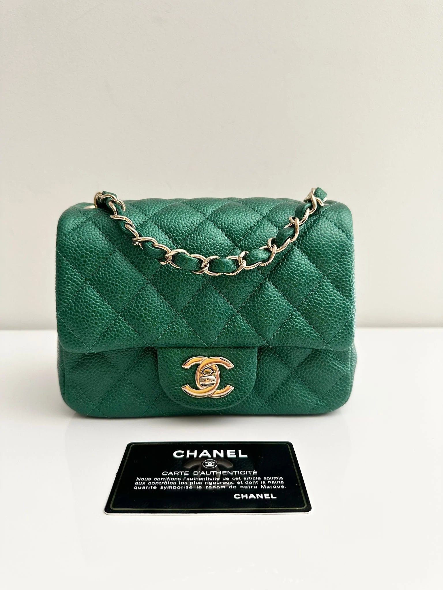 Chanel bags with modern touchesCHANEL Classic Mini Caviar Flap 18s Emerald Green Light Gold Hardware