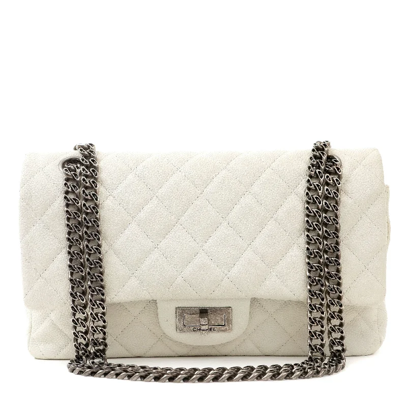 Chanel bags for those who value investment piecesChanel Ivory Grey Caviar Medium Reissue 2.55 w/ Gunmetal Hardware