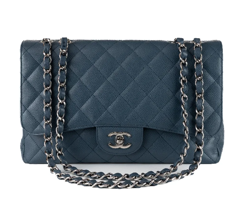 Chanel bags in luxury boutiques worldwideChanel Navy Blue Caviar Jumbo Classic w/ Silver Hardware