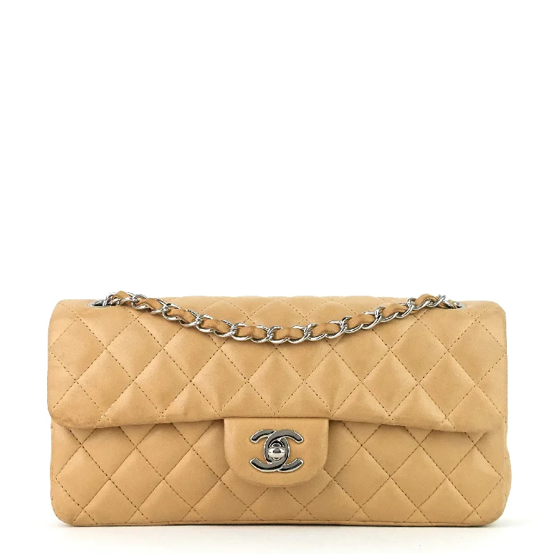 Chanel bags available at online luxury retaileEast West Quilted Lambskin Flap Bag